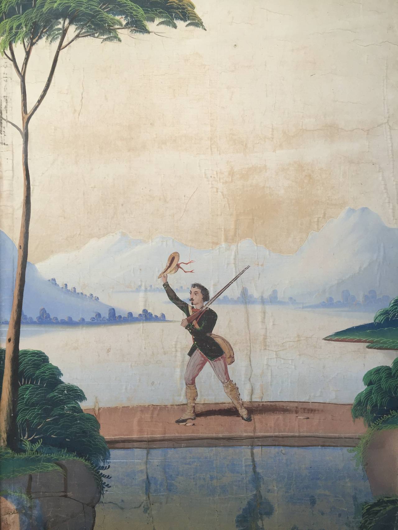 Duck hunting.  In a marsh.  This pair of circa 1830's hand painted European scenic wall paper panels is either French or Italian in origin and depicts a duck hunt taking place in a marsh.  The pastel palette is heightened by the strong green in both