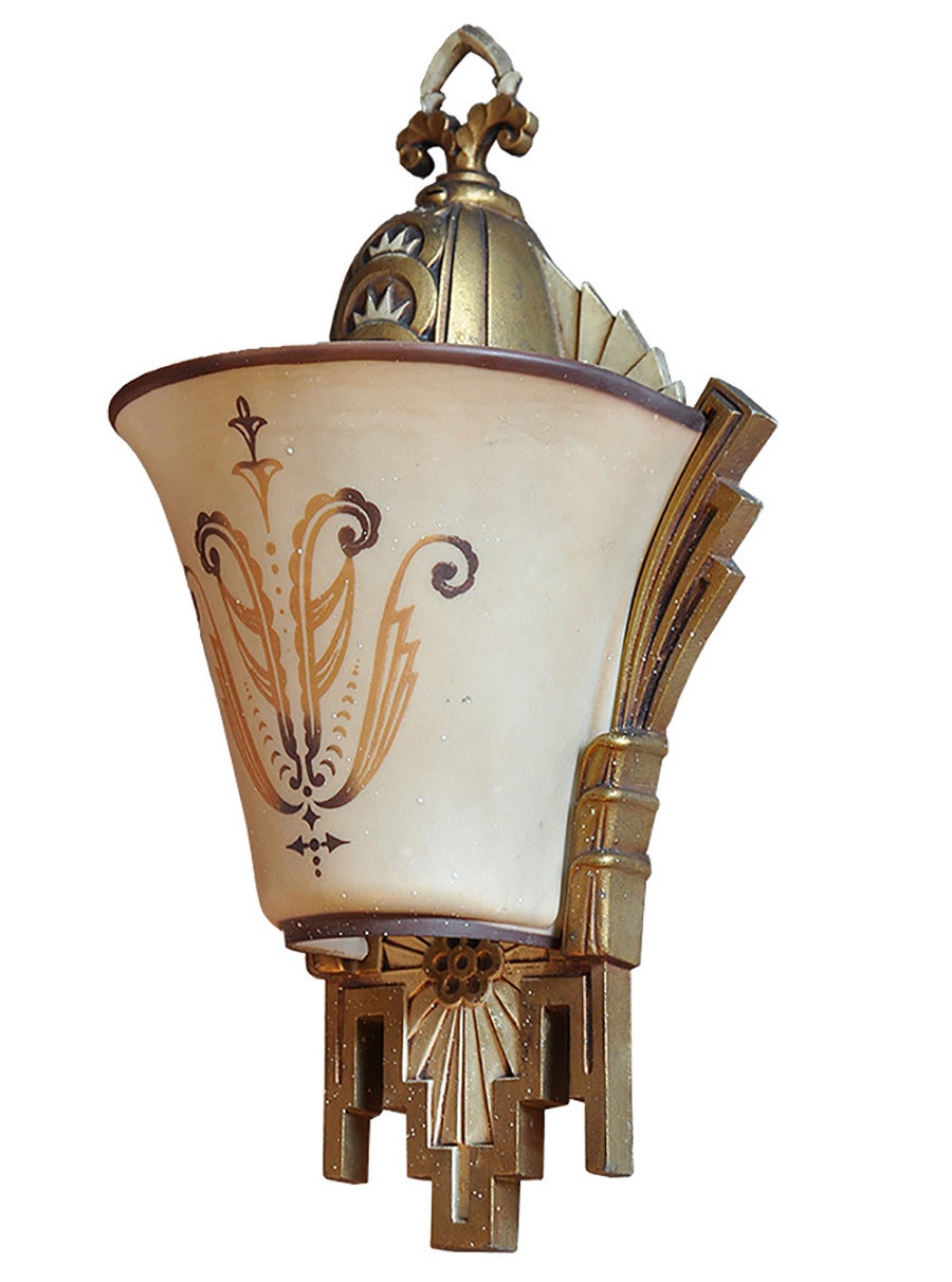 Produced from Chicago’s Premium lighting supplier in the 1930’s, this set of 5 sconces are signed Williamson & Co, a truly rare find of antique art deco glass and the ‘slipper shade’.  Often this design is signed both Williamson and Beardslee, a