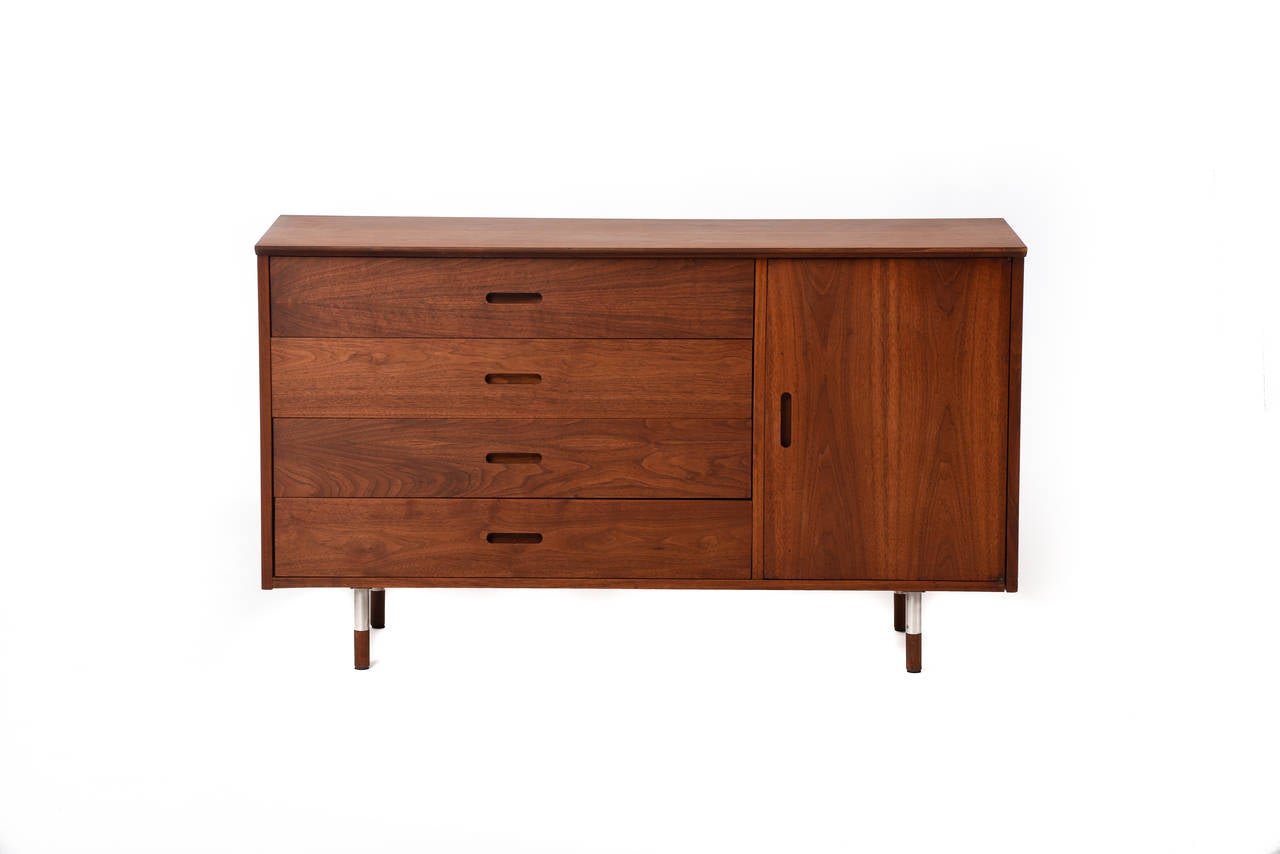 A rare sectional credenza in walnut designed by Arne Vodder for Sibast. Dimensions: 54" x 18" x 31" (for larger piece) 36" x 18" x 31" (for smaller piece).