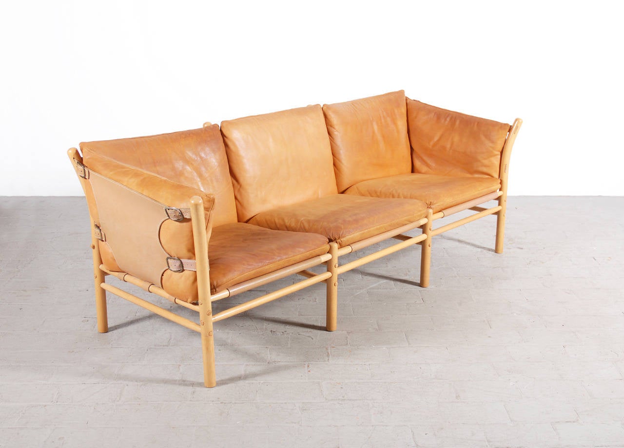 Very Nice and Comfortable 3 seater sofa designed by Arne Norell for Arne Norell AB Aneby, Sweden, 1960.
Solid birch Frame and Lovely original tawny color patinated leather.
Excellent Condition.

We offer competitive and high quality delivery