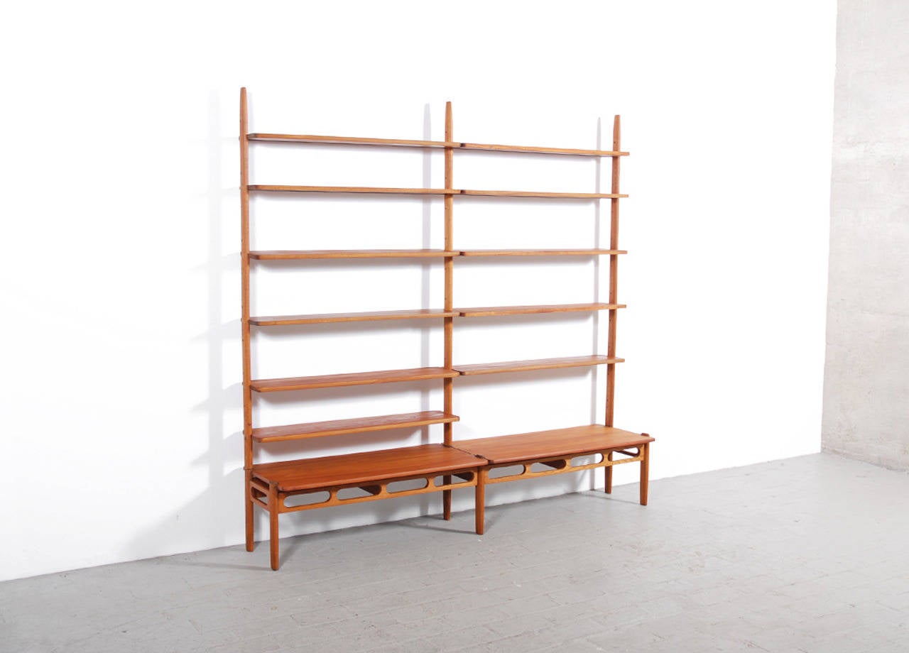 Very nice Danish Teak and Oak Modular Bookcase, adjustable shelves system from 1950.

Ask us a delivery quote by email to any location in the world with your full address and all details (Floor, stairs or elevator, etc) you will receive a prompt