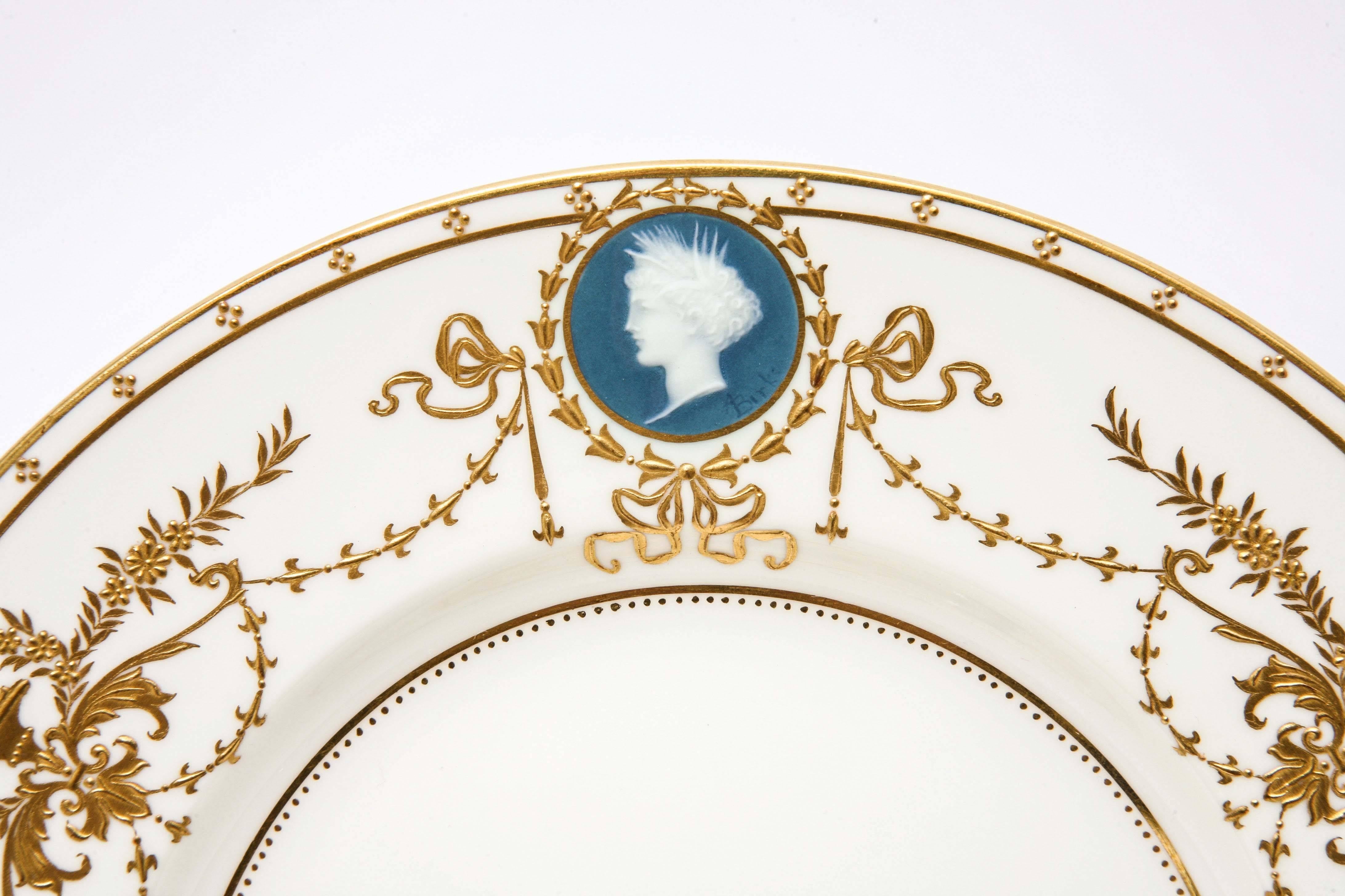 An elegant and wonderful find featuring the pinnacle of porcelain artistry. This complete set of 4 Minton, England for Tiffany’s Pâte-sur-pâte luncheon or dessert plates decorated by the legendary Alboin Birks dates to 1923 – the height of the