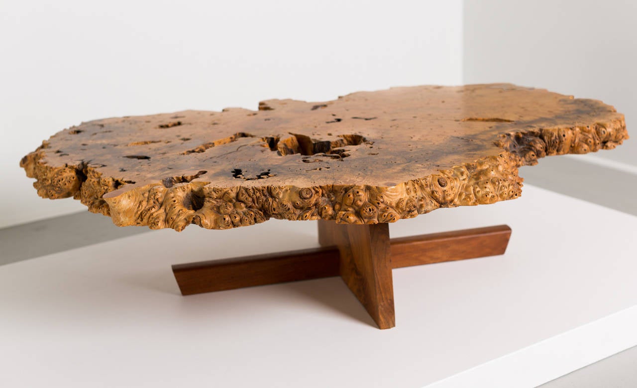 George Nakashima Rare Coffee Table
USA, 1977
Buckeye maple burl, American black walnut, rosewood
58.5 w x 40 d x 14.25 h inches

A masterpiece, this table features a highly-figured single slab top with continuous burled free edge, numerous
