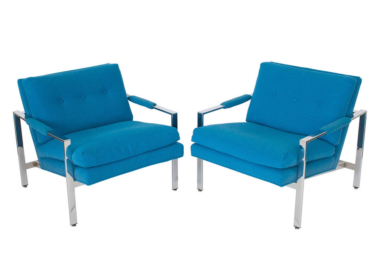 Striking pair of Milo Baughman Thayer Coggin chrome flat bar arm chairs. Upholstered in the original bright marine blue woven fabric.  Semi attached back cushion and loose seat cushion. The 1.5