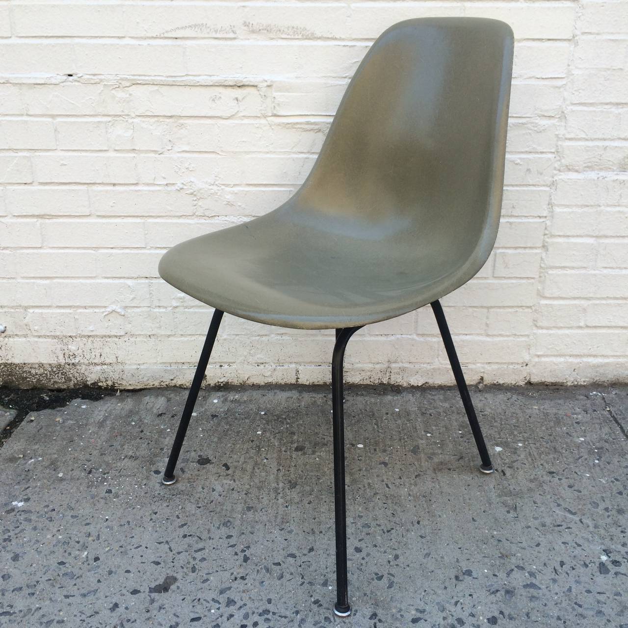 Rare color Raw Umber Herman Miller Eames fiberglass side chair. DSX model. Black base. Shell is in very good vintage condition. Normal edge wear from use but no cracks, gouges, dings, dents, holes. Color is rich, even, without fading.