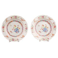 Pair Chinese export porcelain soup plates with trumpet players, mid 18th century