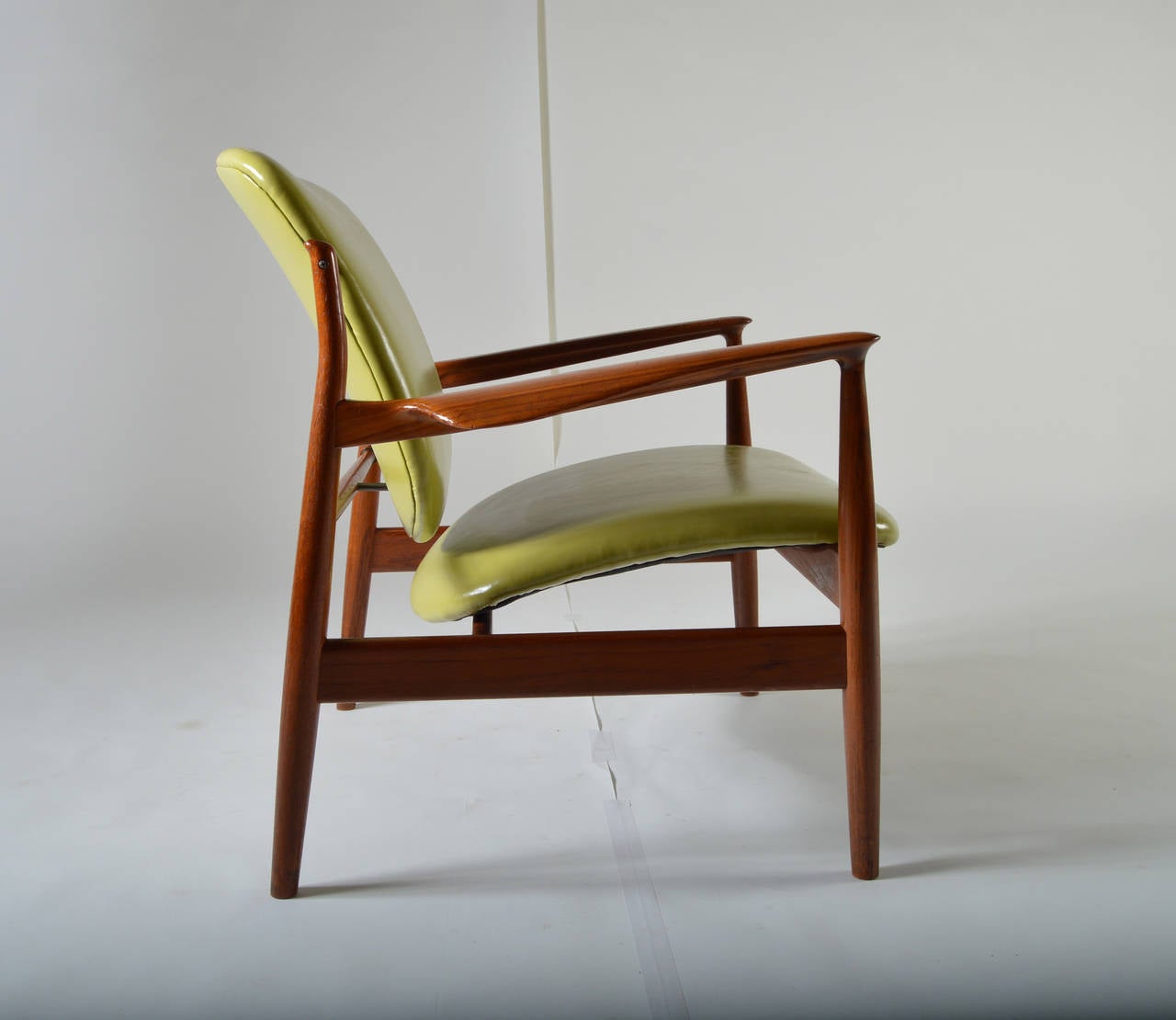 Easy chair model FD 136 designed by Finn Juhl having original France & Son label on frame.