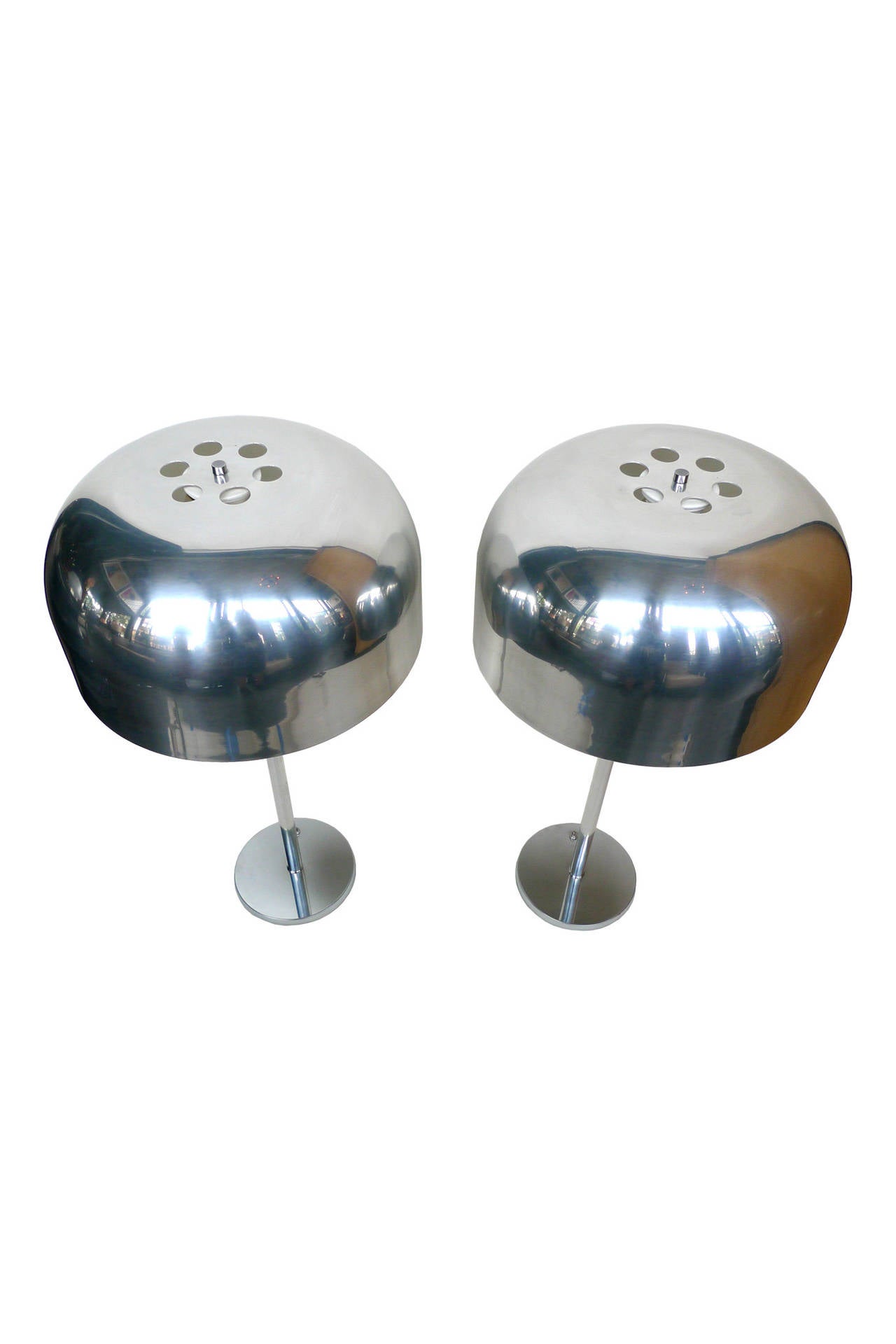 These Kovacs lamps stand out with their reflective surfaces and beautiful dome-shaped shades. They are newly rewired and can be easily turned on/off with their base-switch. Each lamp can take three bulbs. 

17