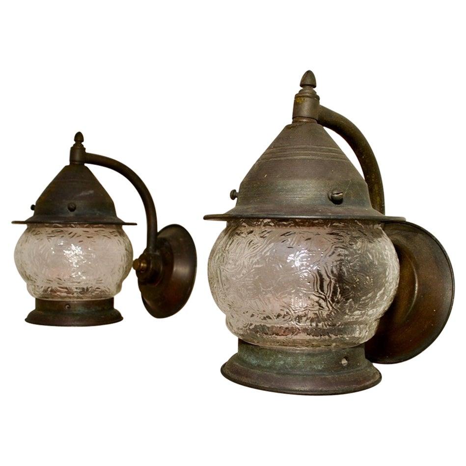 Pair of 1930s copper outdoor sconces.
 