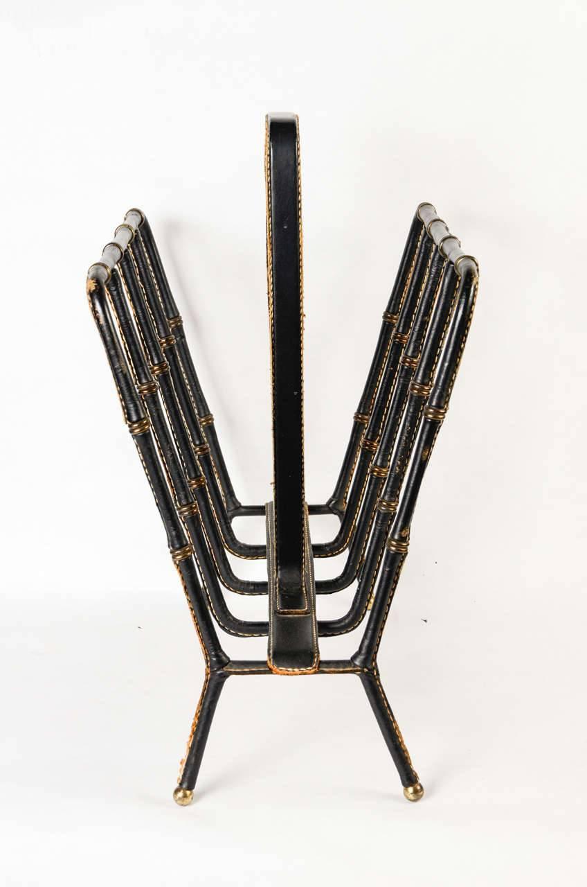 Mid-20th Century Book Rack by Jacques Adnet For Sale