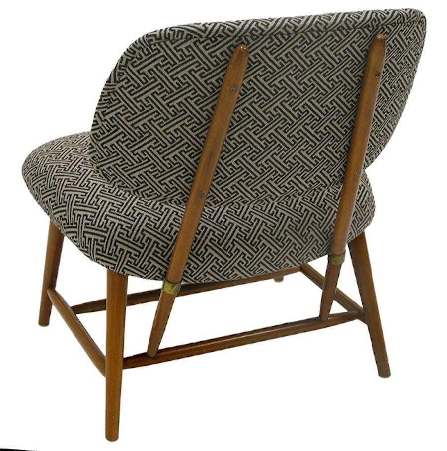 Pair of Mid Century TV chairs by Alf Svensson for Ljungs Industrier AB. Padded seat and backrest recently upholstered in durable Sunbrella fabric.

Measures: Height: 27.5 in. (70 cm).
Width: 24 in. (61 cm).
Depth: 23 in. (58 cm).
Seat height: