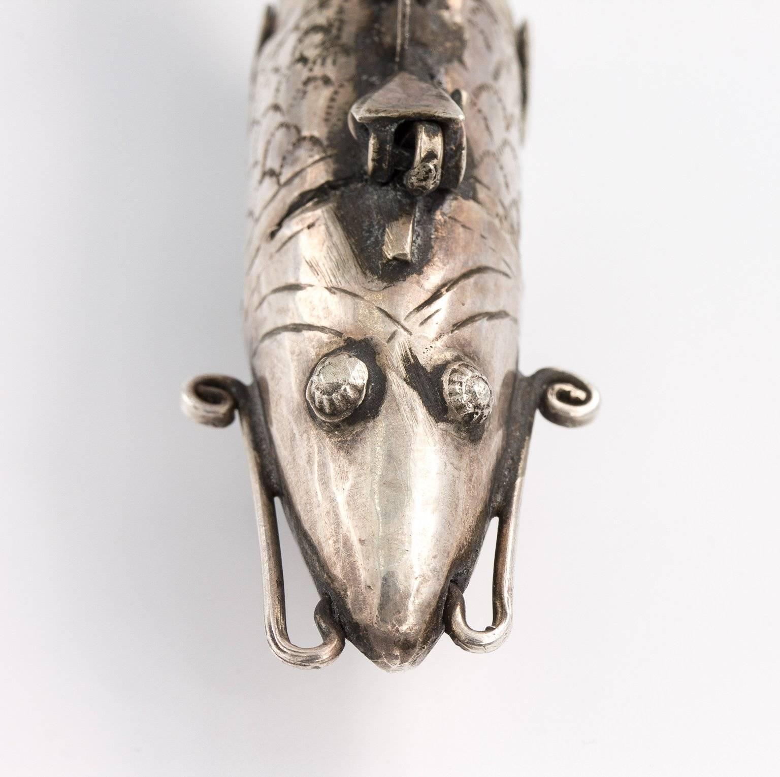A fine quality antique articulated fish form spice box in sterling silver. Most likely 19th century.