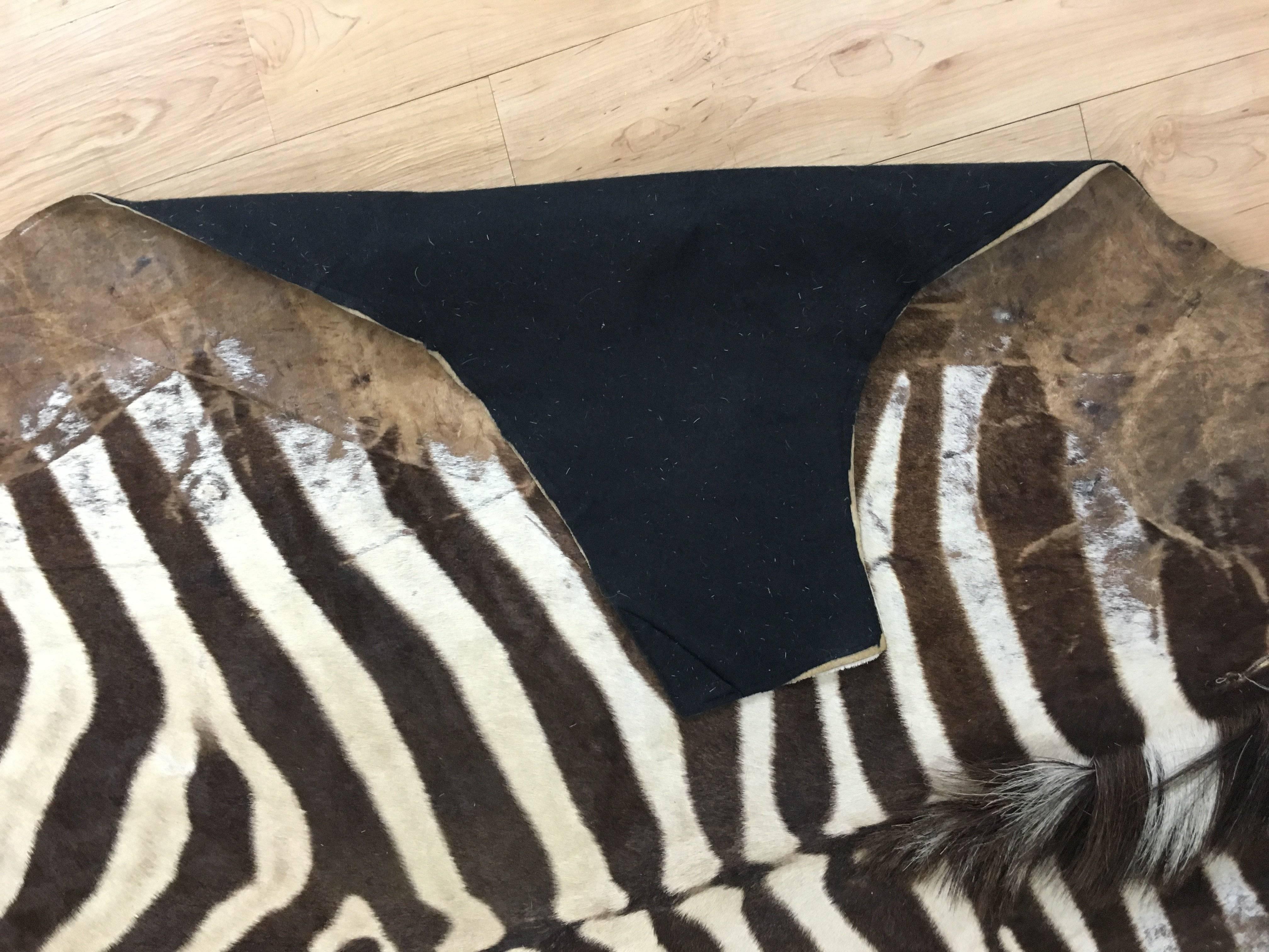 Vintage zebra hide rug.