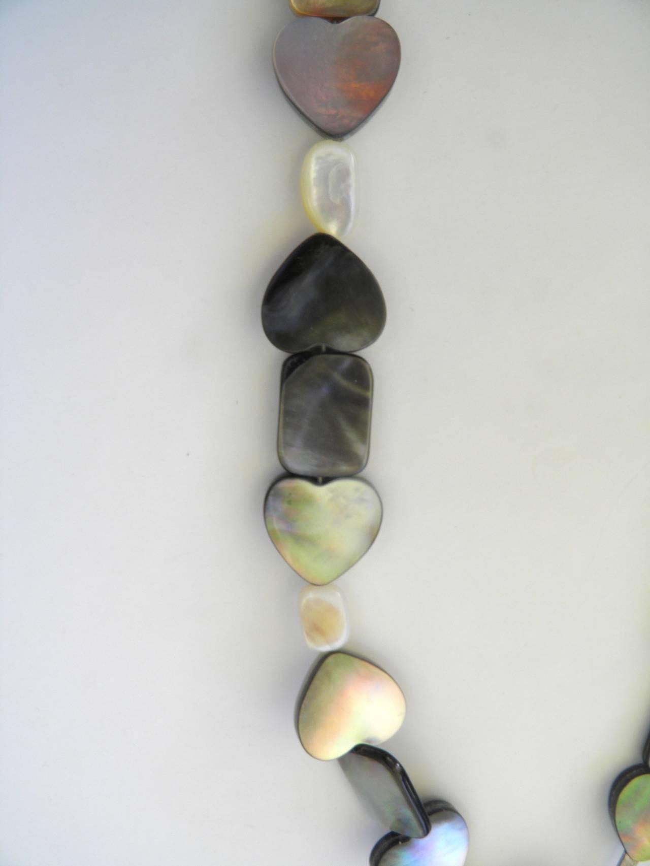 Modernist Lustrous Mother-of-Pearl Sterling Silver 'LOVE' Heart Pendant Necklace For Sale