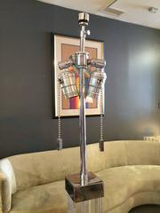 Pareja de lámparas de pie de lucita y cromo de Karl Springer