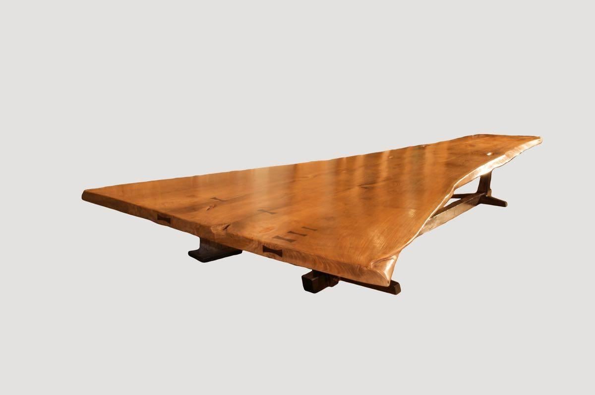 An impressive dining table with a dramatic width graduating from 36” to 88”. The Teak Butterfly Table is made from reclaimed teak wood with contrasting sono wood butterfly accents. Three single teak panels are taken from a 200 year old fallen teak