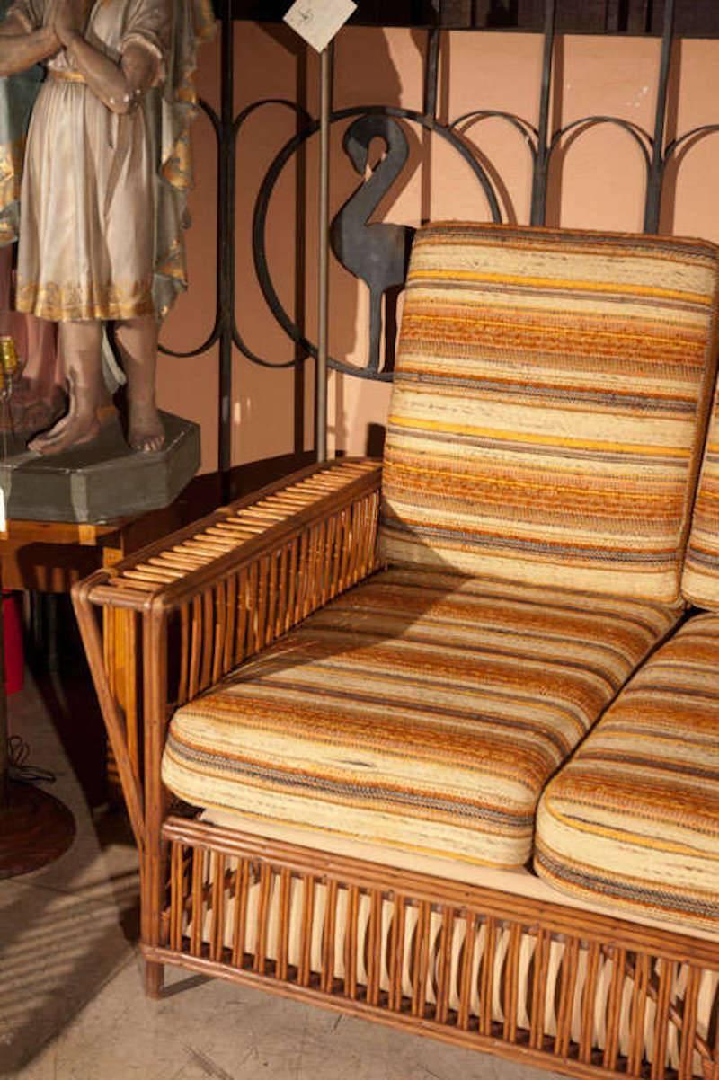 Great 1940s Rattan Wicker sofa with original fabric.