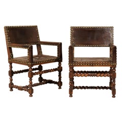 Pair of French 1920s Wood and Leather Armchairs with Turned Legs and Nail-Heads