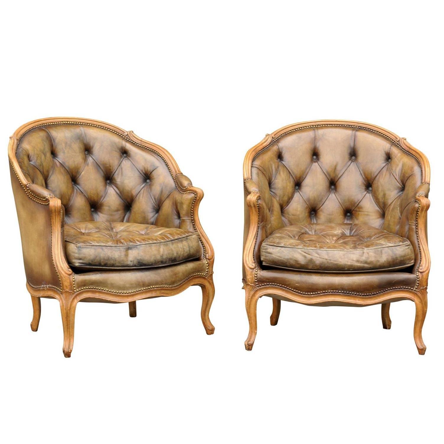 Pair of 1940s French Louis XV Style Tufted Leather Barrel Back Bergeres Chairs