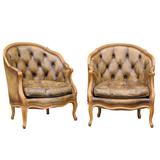 Pair of 1940s French Louis XV Style Tufted Leather Barrel Back Bergeres Chairs