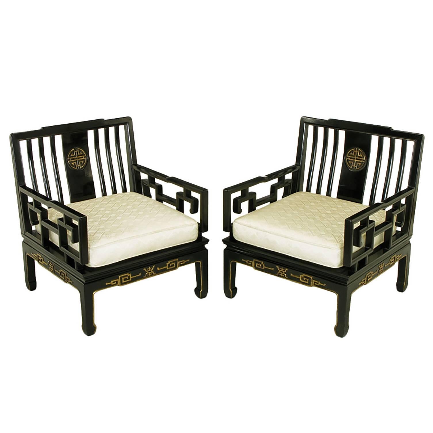 Pair of Ebonized and Parcel-Gilt Asian Club Chairs