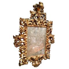 Miroir baroque italien dramatique en bois doré