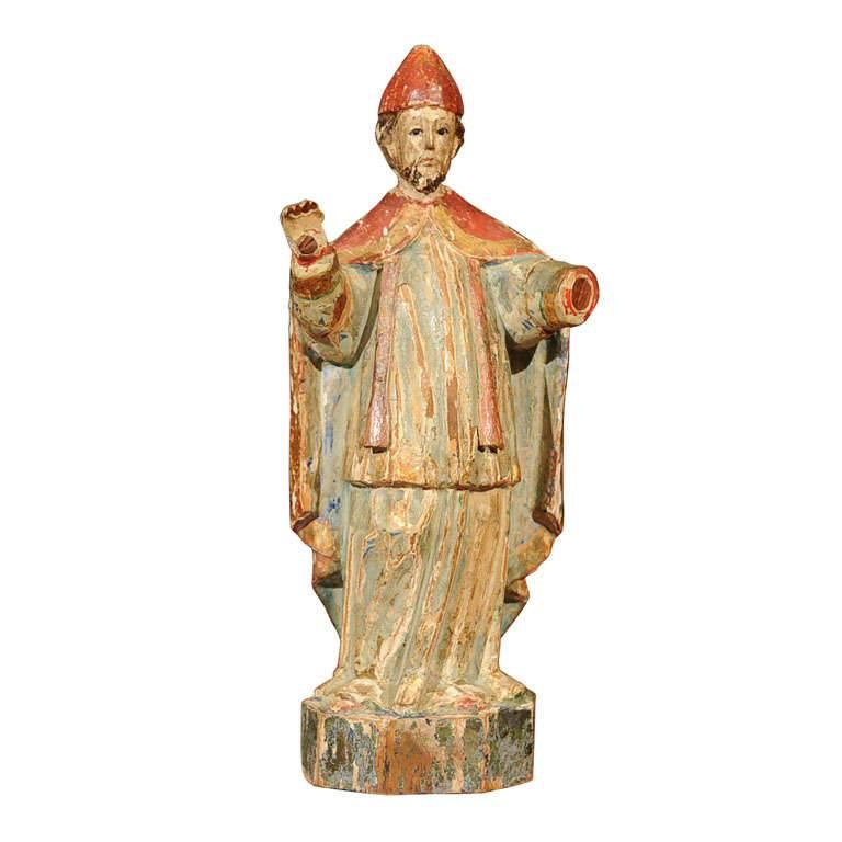 Colonial Carved Wood and Polychrome Figure of a Bishop For Sale