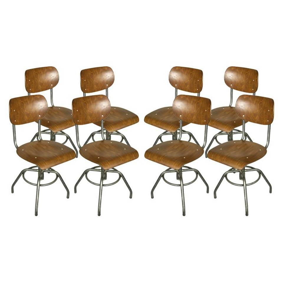 Eight French Industrial Steel and Wood Chairs, Adjustable Height