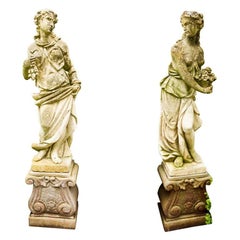 Pair of Hand-Carved Limestone Figures, "Autumn" and "Spring" on Pedestals 