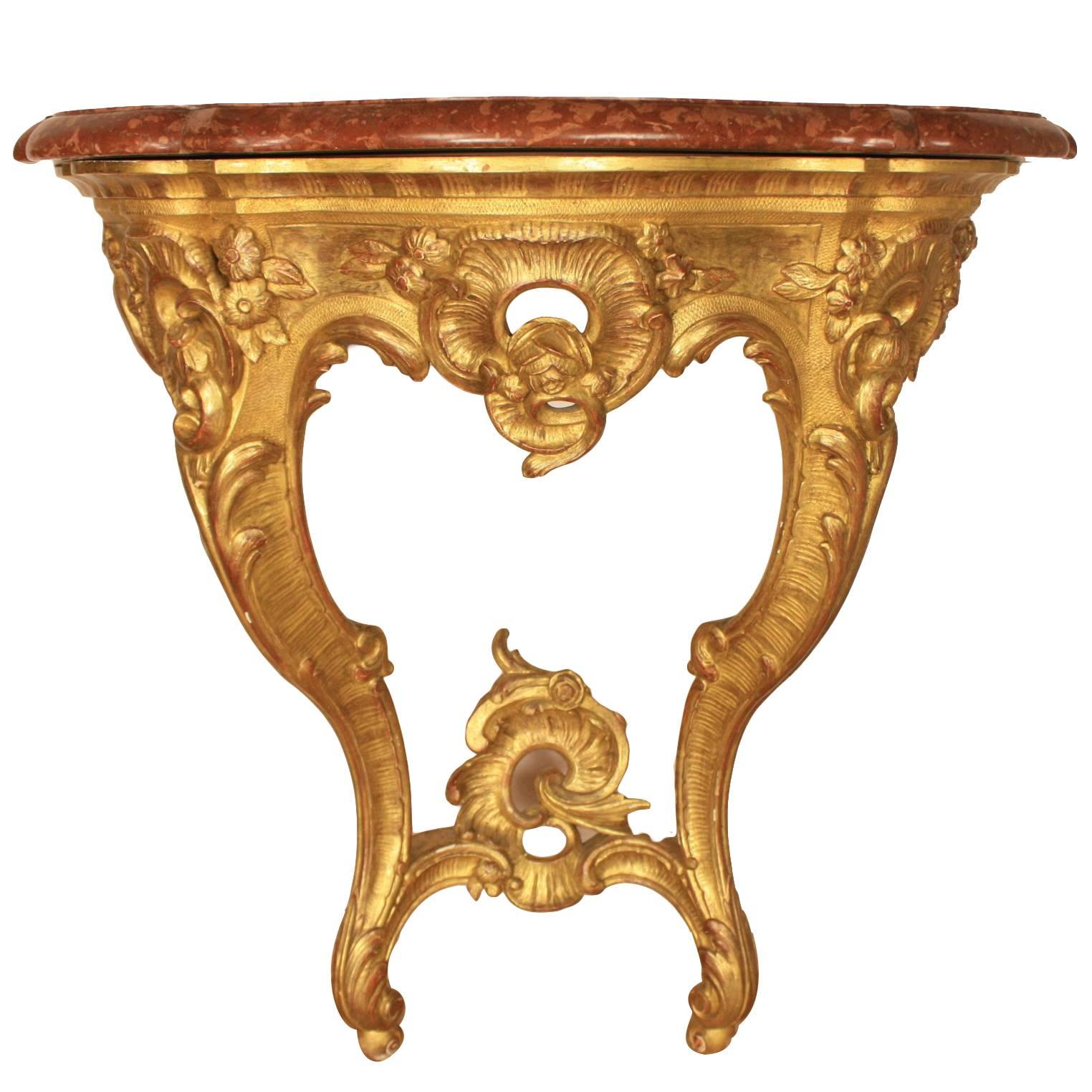 Console italienne du début du XXe siècle en bois doré de style Louis XV