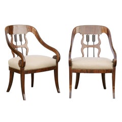Pair of Austrian 1860s Biedermeier Armchairs with Arrow Motifs and Scrolled Arms Pair of Austrian 1860s Biedermeier Armchairs with Arrow Motifs and Scrolled Arms