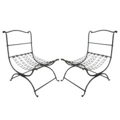 Rare Pair of French Hammered Iron and Chain Lounge Chairs by Jean-Charles Moreux