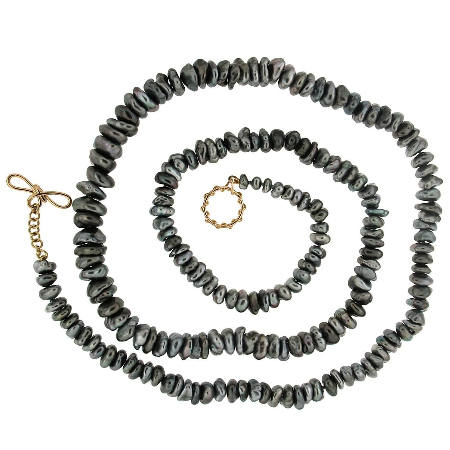 Long Single strand of Tahitian Keshi pearls Necklace