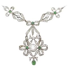 1900s 0.15 Carat Peridot 2.53 Carat Diamond Platinum Pendant 11