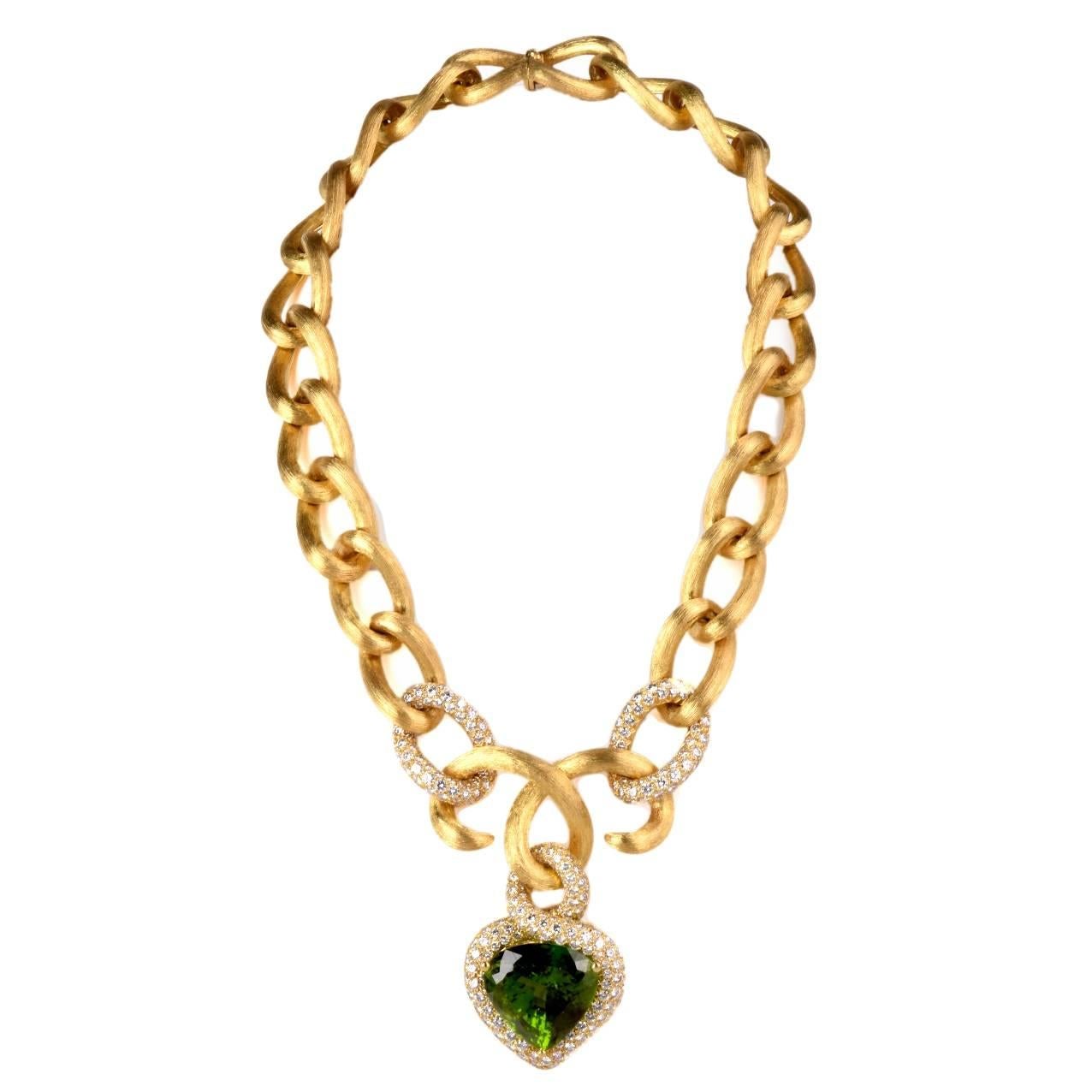 This exquisite rare size peridot diamond pendant necklace is an authentic piece designed by Henry Dunay, bearing the designer's signature. It comprises a breath-taking GIA certified Pear Shape modified brilliant-cut peridot approx. 45.65 cts of