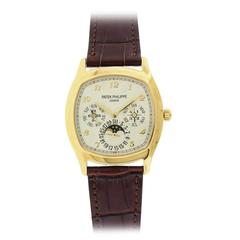 Patek Philippe Yellow gold Moonphase Perpetual Calendar Wristwatch Ref. 5940J 