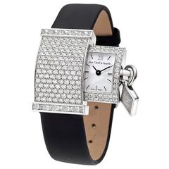 Van Cleef & Arpels Lady's White Gold Diamond Pavé secret Wristwatch
