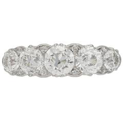 Antique five stone diamond carved half hoop ring, circa 1905. 3
