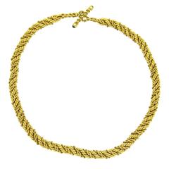 Classic Tiffany & Co. Jean Schlumberger Emerald Gold Twist Rope Toggle Necklace 