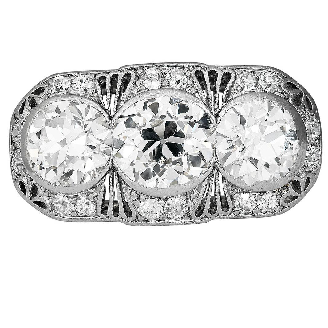 Antique Three-Stone Diamond Platinum Ring For Sale