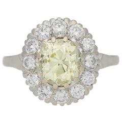 Fancy light yellow diamond cluster ring, circa 1950. 5