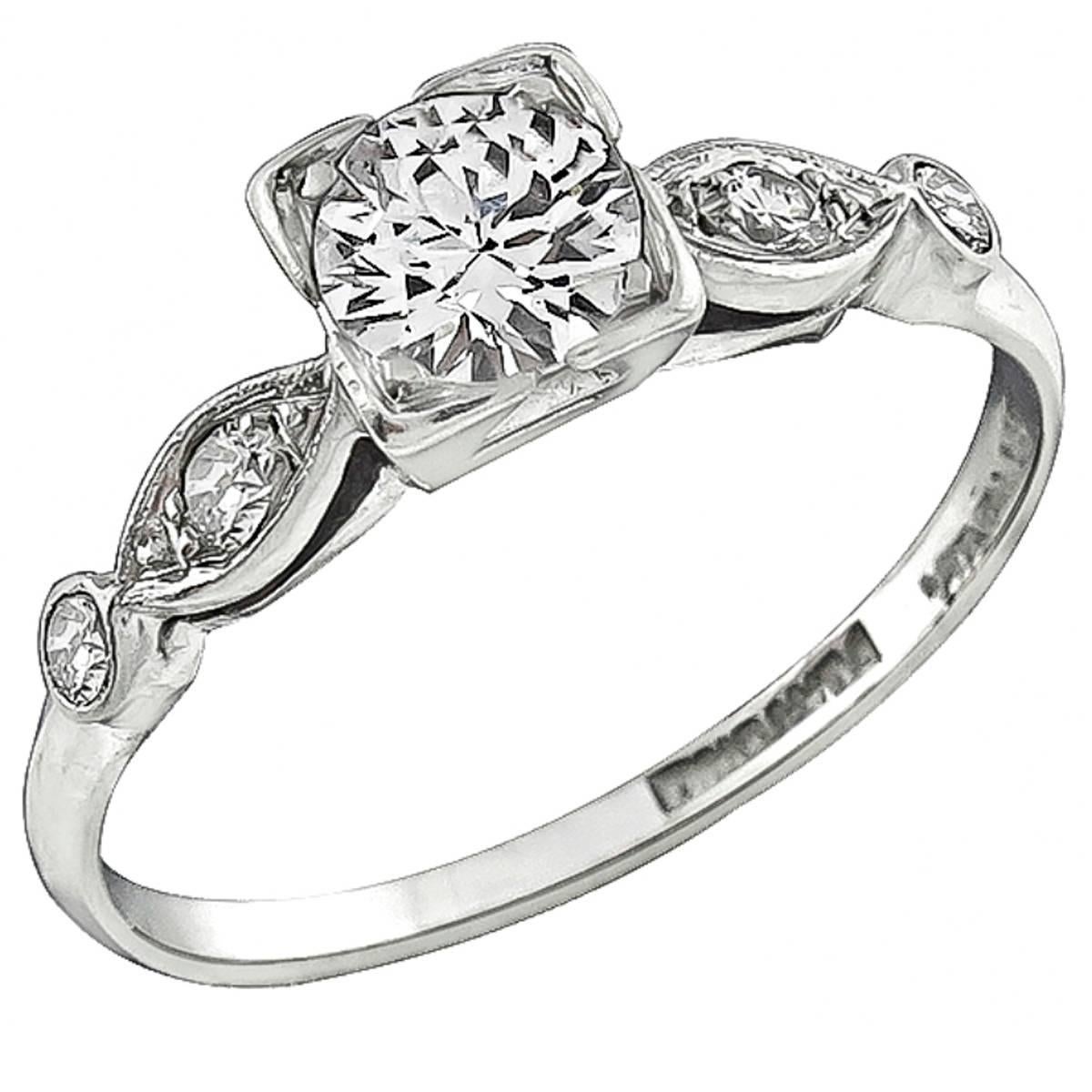 Charming Round Cut Diamond Platinum Engagement Ring For Sale