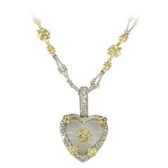 Collier à chaîne en or orné d'un cœur en stambouliote et de diamants