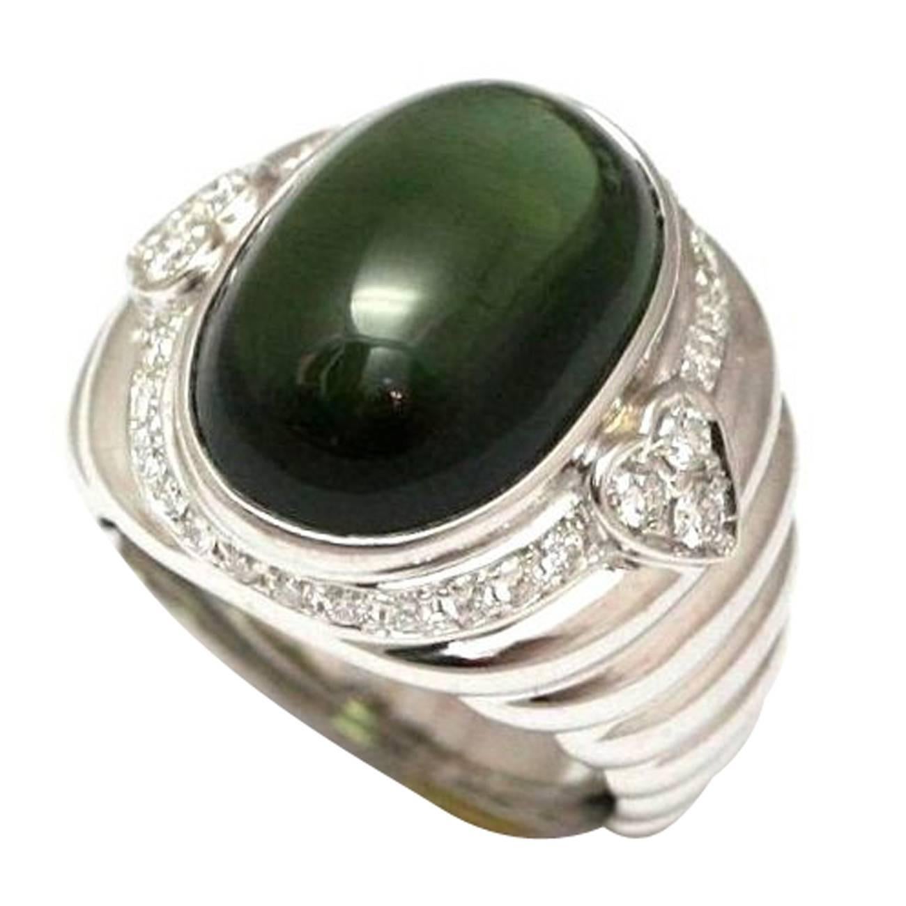 Repossi green tourmaline gold dome ring