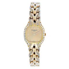 Patek Philippe lady's yellow gold diamond LaFlamme Quartz Wristwatch ref 4715/3