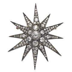 A Late Victorian diamond silver gold star brooch
