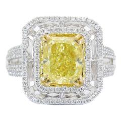 3.01 carat GIA Cert Fancy Intense Yellow Diamond gold Halo Ring 3.01 carat GIA Cert Fancy Intense Yellow Diamond gold Halo Ring