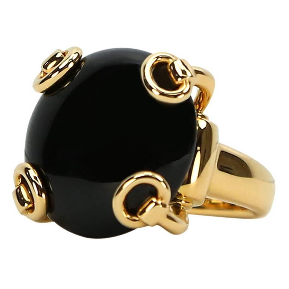 Gucci Onyx Gold Stirrup Ring