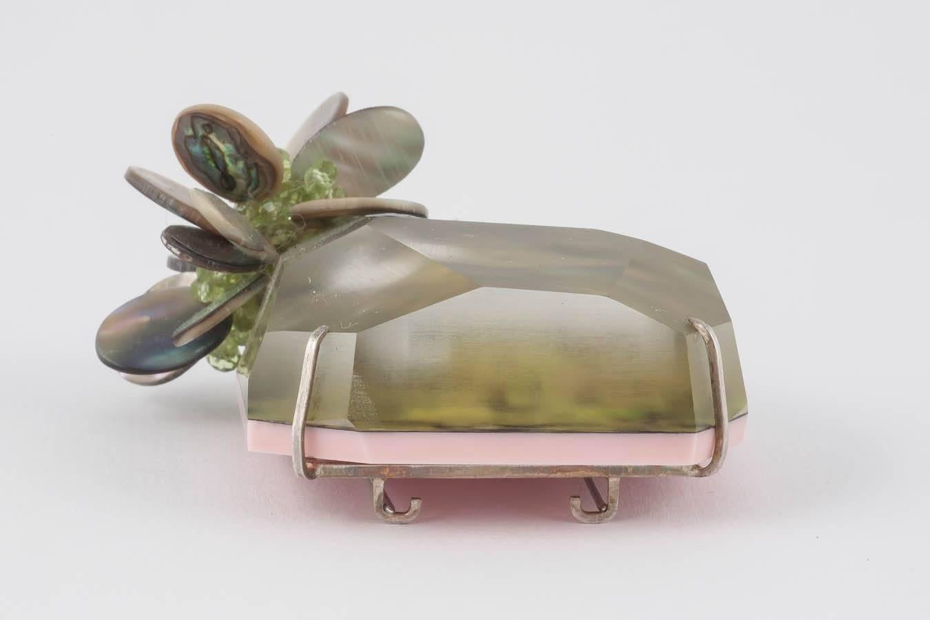 Women's Donna Brennan Paura Shell and Lucite Brooch with Peridot Clusters For Sale