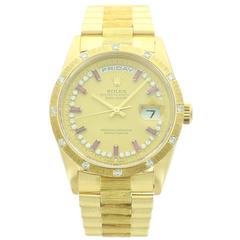 Rolex yellow gold diamond ruby dial Day-Date wristwatch ref. 18308 